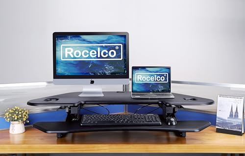 46" Height Adjustable Corner Standing Desk Converter with AC Outlet USB Charger and Dual Monitor Arm Mount Black B352
